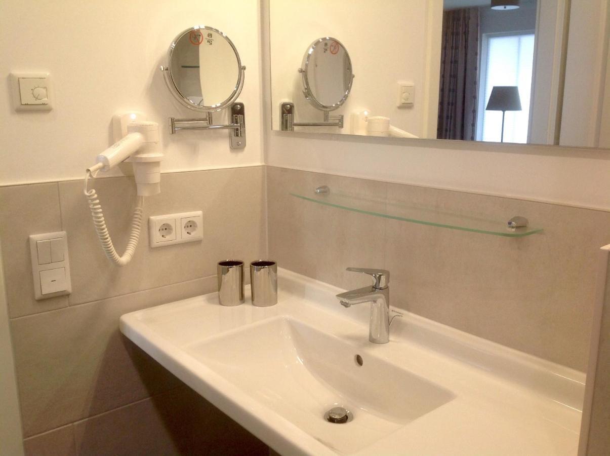 Sunny Suite 14 - elegantes Hotelapartment mit großem Pool-Wellnesbereich und seitlichem Meerblick Börgerende-Rethwisch Exterior foto