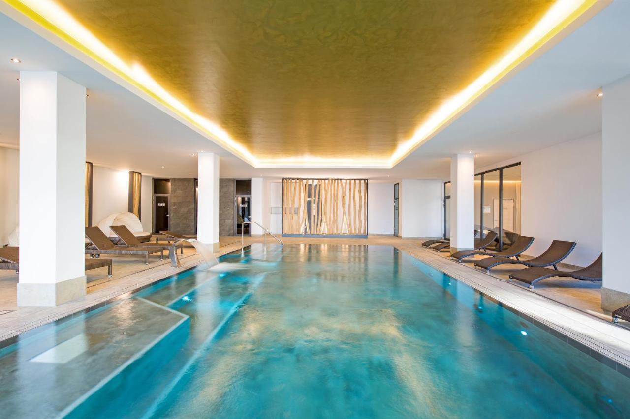 Sunny Suite 14 - elegantes Hotelapartment mit großem Pool-Wellnesbereich und seitlichem Meerblick Börgerende-Rethwisch Exterior foto