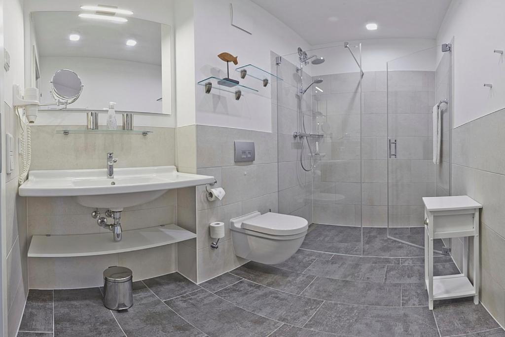 Sunny Suite 14 - elegantes Hotelapartment mit großem Pool-Wellnesbereich und seitlichem Meerblick Börgerende-Rethwisch Exterior foto